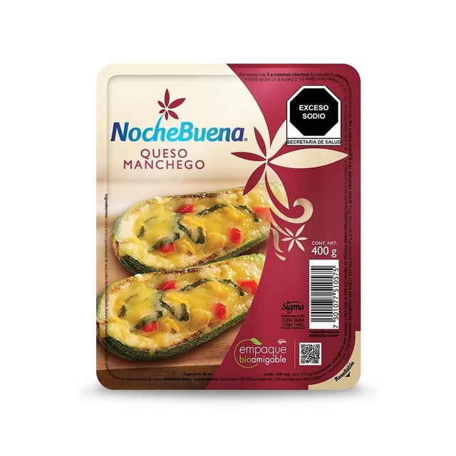 queso manchego nochebuena 32 en bloque 400 g Empaque frontal del bloque de queso Manchego Noche Buena 400 g con fondo crema y rojo; muestra dos mitades de calabacita rellenas con queso derretido, trozos rojos y hojas verdes, logotipo Noche Buena y sello 'Exceso sodio'. Adecuado para tablas de bocadillos y gratinados.
