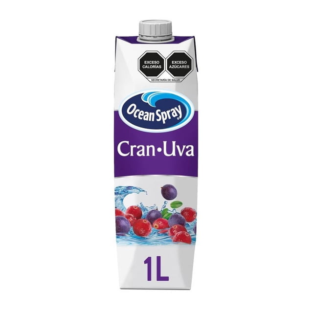 bebida ocean spray arándano y uva 1 l envase frontal tipo tetrapak, vista centrada y de frente; etiqueta morada con logo Ocean Spray y texto “Cran·Uva”, ilustración de arándanos y uvas sobre salpicadura de agua, tapa rosca gris arriba y marca de volumen “1L” en la base; a menudo usada como mezcla refrescante para bebidas.
