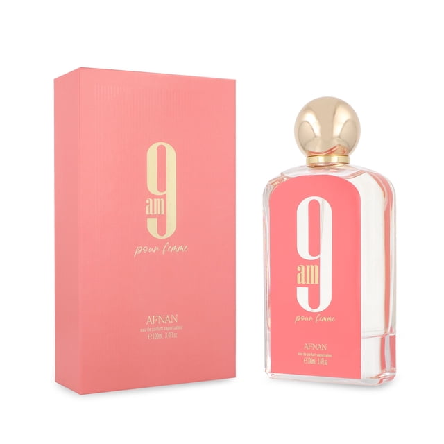 afnan 9am pour femme eau de parfum spray afnan model 100 ml — Frasco rectangular de vidrio con etiqueta coral y número 9 grande en dorado, tapón esférico dorado; caja a juego color coral con tipografía dorada. Notas de salida: mandarina, bergamota y toronja; corazón: frambuesa y grosellas negras; fondo: almizcle, ámbar y naranja. Suele utilizarse como opción de regalo.