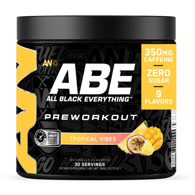 Polvo Pre Workout ABE All Black Everything, 30 porciones pre-entreno — tarro frontal negro con etiqueta negra y acentos amarillos; logotipo 'ABE All Black Everything' centrado, texto 'PREWORKOUT', banda amarilla 'Tropical Vibes', iconos '350 mg caffeine' y 'Zero Sugar', ilustración de mango y maracuyá, tapa negra, fondo neutro.