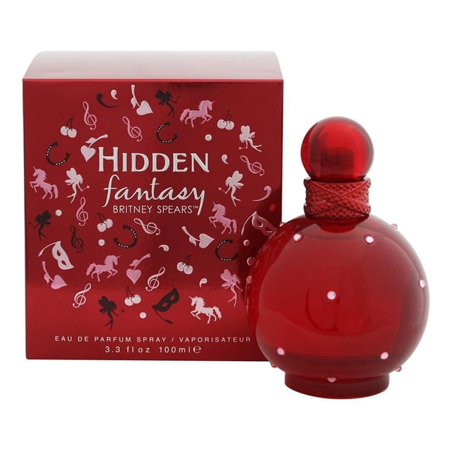perfume britney spears dama eau de parfum 100 ml Frasco redondo rojo con tapa esférica y cordón trenzado; caja roja decorada con iconos rosas y texto 'Hidden fantasy' a la izquierda, vista frontal sobre fondo blanco. Aroma floral-frutal según ficha; a menudo se usa como pieza decorativa en tocadores.