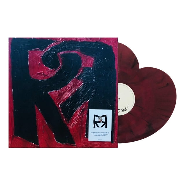 rosalia & rauw alejandro rr hearth lp rojo red vinyl portada frontal con gran R negra sobre fondo rojo texturizado; disco de 12" en forma de corazón rojo splatter con vetas negras a la derecha; sticker blanco indica 1 LP con 3 canciones: Beso, Vampiros, Promesa; también suele usarse como pieza de colección o exhibición.