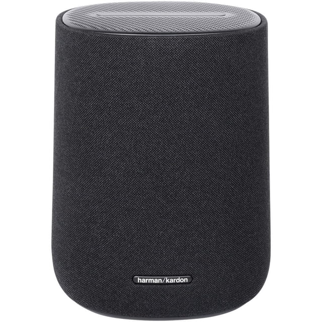 parlante harman kardon enchant con cable dolby atmos negro parlante compacto cilíndrico frontal con cubierta textil negra, rejilla superior circular y logotipo Harman Kardon en la base; 16×16×20 cm, conectividad por cable, Bluetooth, Wi‑Fi, AirPlay y Chromecast, Spotify Connect y audio espacial 3D Dolby Atmos para entretenimiento en el hogar; también apto como altavoz principal para escritorios o salas pequeñas.
