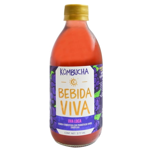bebida kombucha con probióticos uva 377 ml botella GT's Bebida Viva, vista frontal centrada de botella plástica translúcida de 377 ml con tapa amarilla; líquido rojo-púrpura, etiqueta blanca y morada que muestra "Kombucha Bebida Viva" y "Uva Loca" con ilustraciones de racimos de uva y leyenda de contenido neto 377 ml.