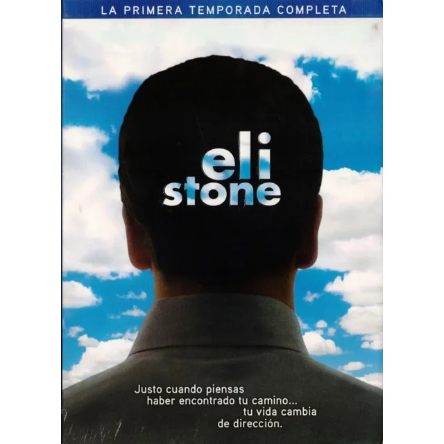 eli stone primera temporada 1 uno dvd abc studios portada con vista posterior de la silueta de un hombre frente a un cielo azul con nubes, título "eli stone" centrado sobre la nuca y texto promocional en la parte inferior; serie de TV en DVD.