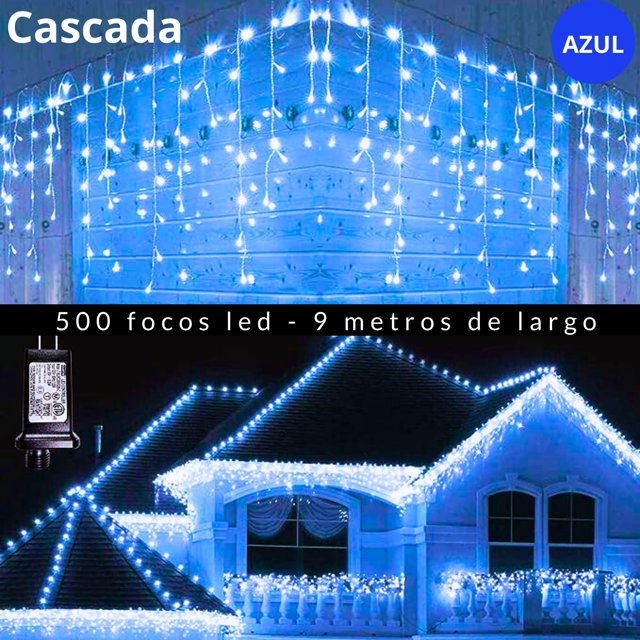cascadas de luces led dosyu 9mts 500 luces navideñas Azul 9 metros y 500 focos LED en cascada, vista frontal de fachada con tiras colgantes y gotas luminosas azules, cable y adaptador visibles; caída irregular, 8 modos de iluminación según especificación, ligera para fácil almacenamiento y con certificaciones de seguridad. Suele usarse en fachadas, bodas y fiestas.