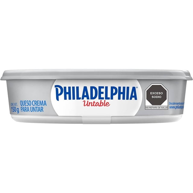 queso crema philadelphia original untable 150 g envase blanco y gris con tapa plana, vista frontal centrada del empaque rectangular de 150 g con logo PHILADELPHIA en azul y texto 'Untable' en rojo, leyenda 'Queso crema para untar 150 g' en el lateral y octágono negro de advertencia 'Exceso sodio'; ideal como untable en desayunos y snacks para la despensa.