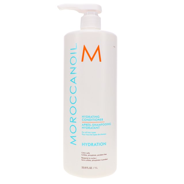 acondicionador hidratante maroccano 33.8 oz botella blanca con dispensador, vista frontal centrada; etiqueta vertical "MOROCCANOIL" en azul y M naranja, texto "Hydration" y marca de 33.8 fl oz/1 L visible. Adecuado para todos los tipos de cabello y uso diario; también es adecuado para mejorar la manejabilidad del cabello.