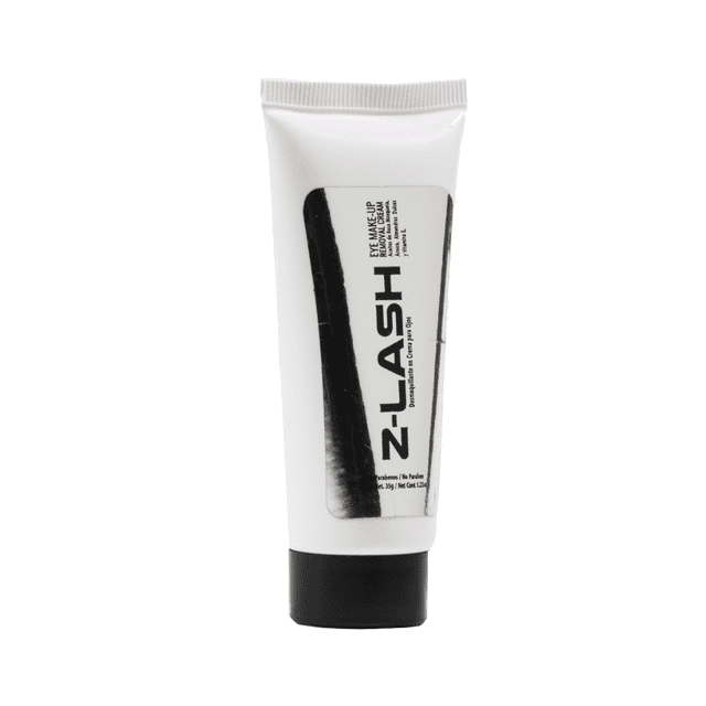 desmaquillante para ojos laguede desmaquillante de ojos crema natural tubo blanco frontal con etiqueta negra vertical y texto Z-LASH, envase plástico con tapa negra; fórmula en crema con panthenol, biotinoyl tripeptide-1, rosa mosqueta y aceite de almendras para remoción de maquillaje y como fortalecedora de pestañas.