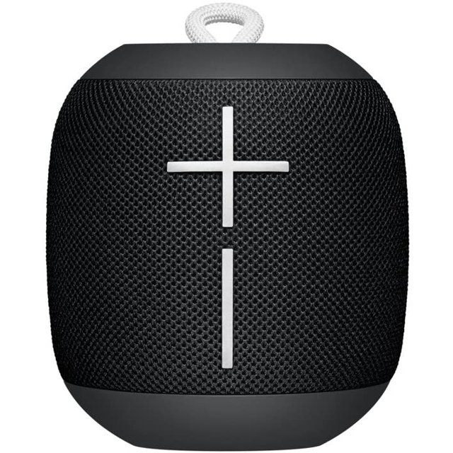ultimate ears wonderboom altavoz bluetooth portatil impermea multicolor — vista frontal centrada de bocina portátil con malla multicolor, botones de volumen en cruz blanca visibles, asa de cuerda superior y base plana; audio Bluetooth para exteriores y a menudo usada para llevar en viajes cortos.