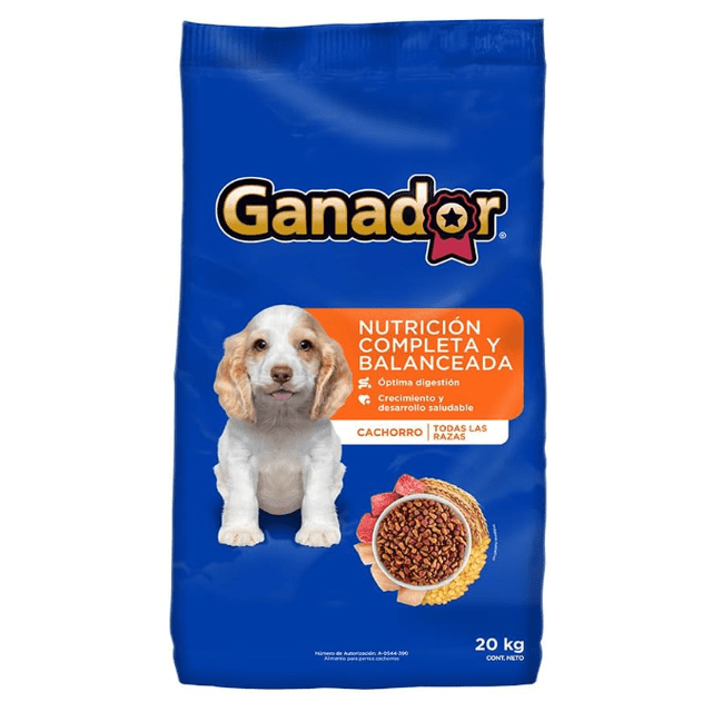 croquetas para perro ganador original cachorro 20 kg Bolsa frontal azul de alimento para cachorro Ganador, 20 kg; logo Ganador en la parte superior, recuadro naranja que indica "Nutrición completa y balanceada" con referencia a digestión y crecimiento, foto de un cachorro blanco y café sentado y cuenco con croquetas visibles. Ideal también como ración de viaje o entrenamiento por su empaque grande y práctico.