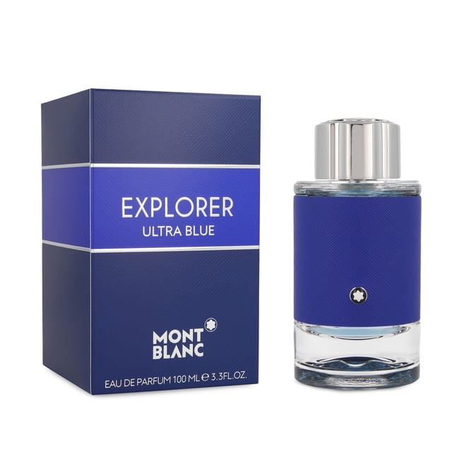 mont blanc explorer ultra blue 100 ml edp spray. Frasco cilíndrico de vidrio transparente con funda texturizada azul y tapón plateado, junto a su caja azul con franjas claras y texto "EXPLORER ULTRA BLUE" y logo Montblanc; 100 ml, fragancia cítrica aromática para caballero con notas marinas y bergamota; también apto como detalle de regalo elegante.