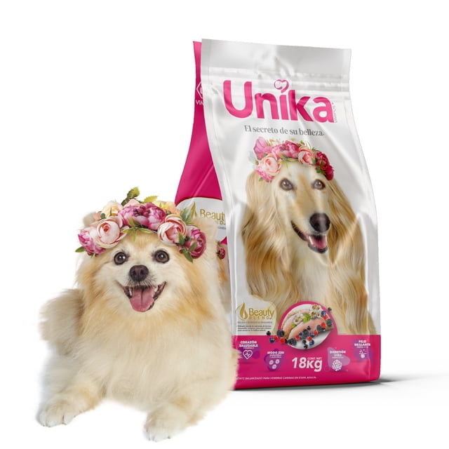 alimento super premium unika el secreto de su belleza 18 kg bolsa blanca y rosa con logo Unika, vista frontal que muestra ilustración de perro de pelo largo con corona floral y texto Beauty Blend en la etiqueta; alimento para perros enfocado en belleza y nutrición según la etiqueta, empaque de 18 kg.