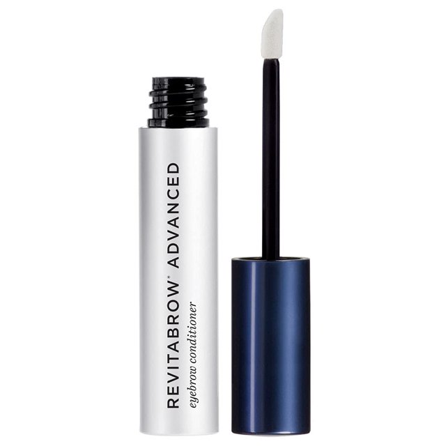 acondicionador de cejas revitalash cosmetics revitabrow advanced 0.1 fl oz, frasco plateado abierto con aplicador de esponja blanca y tapa azul metálica; tubo vertical con texto visible. Especificaciones indican suero médico desarrollado, revisado por oftalmólogos y dermatólogos y libre de crueldad; a menudo usado para peinar y definir cejas.