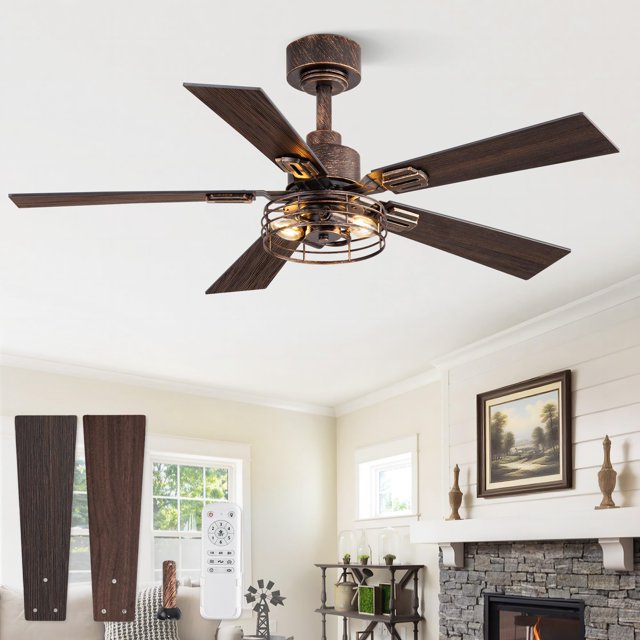 ventilador de techo Fanbulous rústico con jaula y 42" de doble aspa, vista centrada: ventilador estilo granja negro dorado con jaula metálica sobre lámpara y dos portalámparas E12 visibles, cinco pares de aspas dobles en acabado madera oscura, varilla de 15 cm y control remoto mostrado; ideal para dormitorio o sala pequeña, motor DC reversible, temporizador y 6 velocidades según especificaciones; a menudo usado también para ambientación decorativa en estudios pequeños.