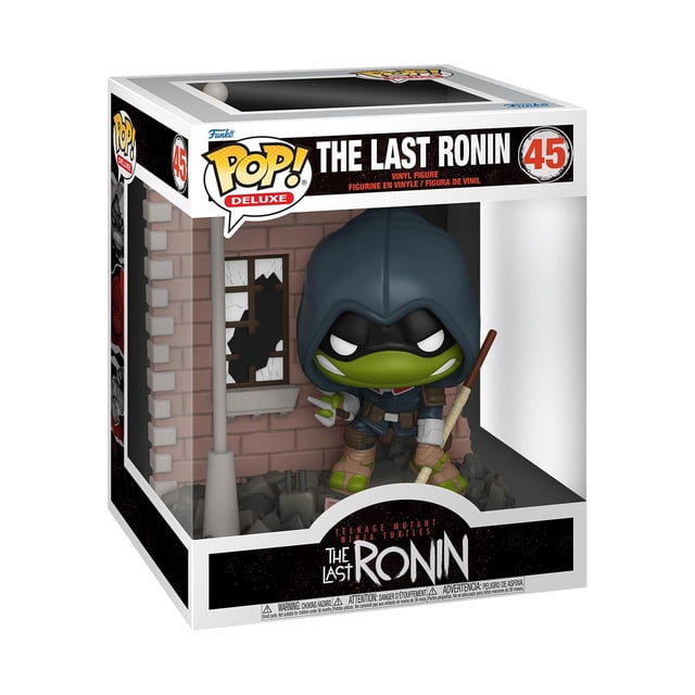 figura de vinilo funko pop! tortugas ninja mutantes adolescentes de lujo The Last Ronin Deluxe, tamaño coleccionable 3.75 pulgadas (3.7 in), vista frontal en caja con ventana; figura con capucha azul oscuro, máscara verde, armadura marrón y bastón sobre base de escombros y poste de farol, embalaje con logo Funko. Ideal para vitrinas o escritorios de coleccionistas.
