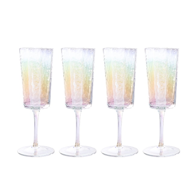 set de copas de vidrio crown baccara 4 piezas de 200 ml - ruan clear Iridiscente, cuatro copas altas de vidrio (h 19 cm, Ø 6 cm, 200 ml) con textura martillada y acabado irisado que cambia tonalidades, tallo y base transparentes sobre fondo blanco; también aptas para servir cócteles o postres en eventos.