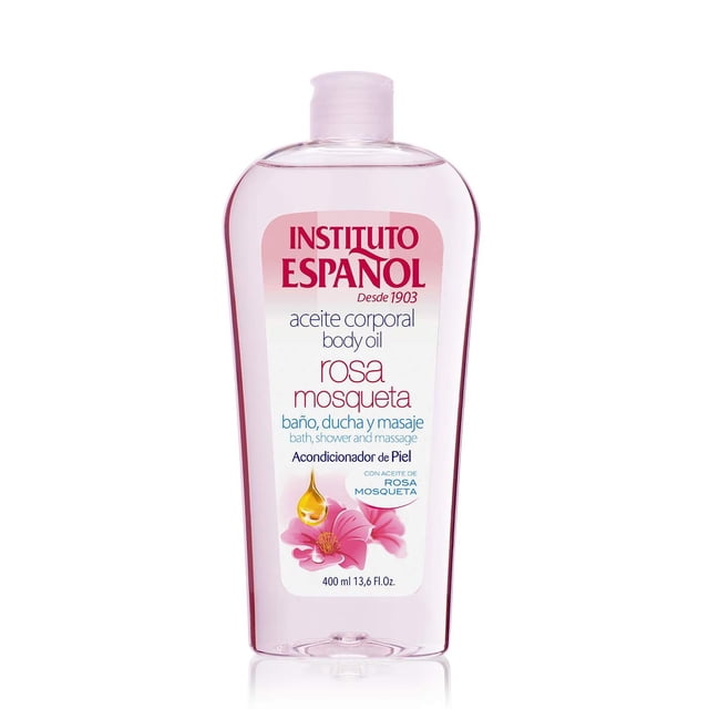 aceite corporal rosa mosqueta 400 ml Instituto Español, botella frontal translúcida rosa con etiqueta blanca y logo rojo, texto 'aceite corporal body oil rosa mosqueta' y flor de rosa en la etiqueta; para baño, ducha y masaje, hidrata y repara piel seca, tamaño compacto de 400 ml, a menudo usado como aceite corporal diario para cuidado y masaje.