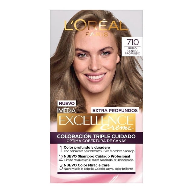 tinte para cabello l'oréal imédia excellence 710 rubio cenizo profundo, empaque frontal con cabello largo ondulado en tono rubio cenizo, logo L’Oréal arriba, cuadro con '710' y rótulo 'Excellence', texto visible 'coloración triple cuidado' y lista de beneficios en la parte inferior.