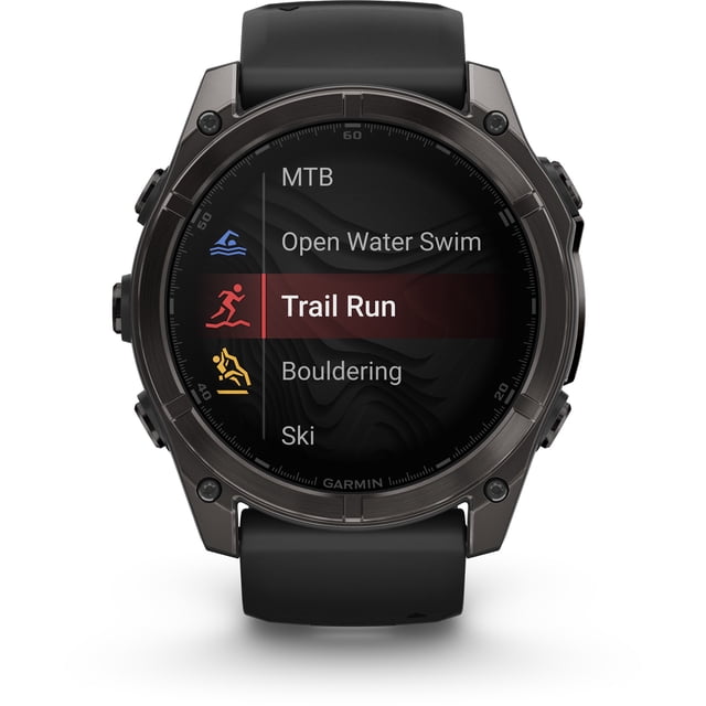garmin, monitor deportivo, fenix 8, 51mm, amoled,sapphire, carbon gray reloj inteligente 51 mm, color negro, bisel gris carbón y pantalla AMOLED frontal que muestra modos de actividad con "Trail Run" resaltado; también muestra MTB, Open Water Swim, Bouldering y Ski; correa de silicón negra, diseñado para multideporte y aventuras al aire libre.