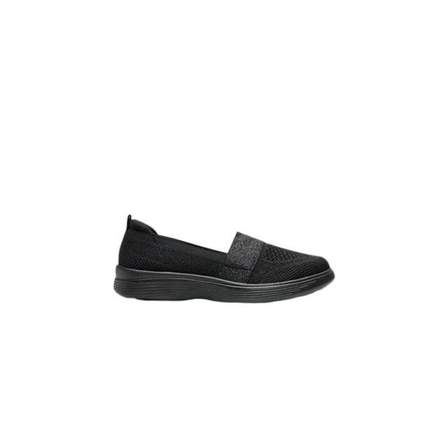 tenis flexi estilo 104932 mujer slip-on tejido casual gris negro 23 Tenis slip-on Flexi para mujer en tejido textil negro, vista lateral derecha. Silueta baja con banda elástica en el empeine, malla tejida en puntera y costados, tirador en talón y suela de EVA negra de perfil elevado; plantilla de cerdo acolchada para confort. Fondo blanco, estilo urbano casual; a menudo se usan para caminar y actividades cotidianas.