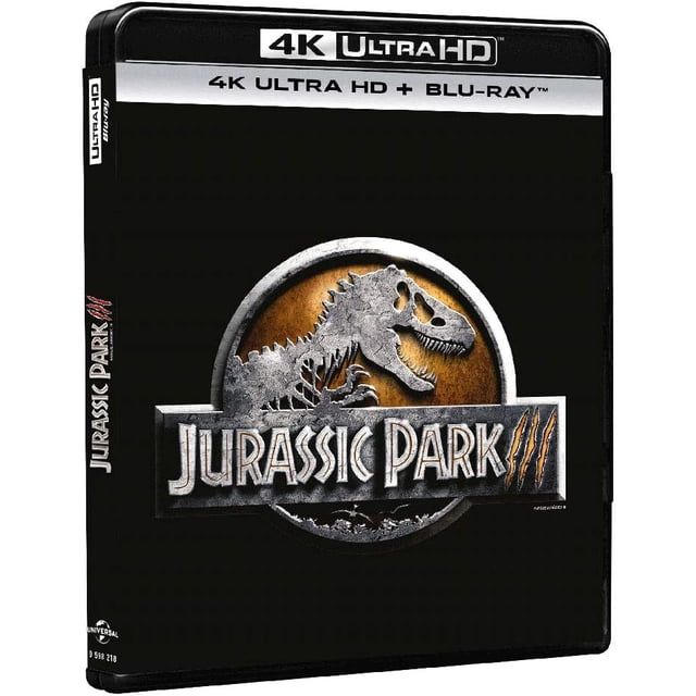 parque jurasico universal jurassic park 3 tres pelicula 4k blu ray Caja frontal centrada de la edición 4K Ultra HD + Blu-ray con el sello '4K Ultra HD' en la banda superior, logo circular de T. rex en relieve sobre fondo negro y título 'Jurassic Park III'.