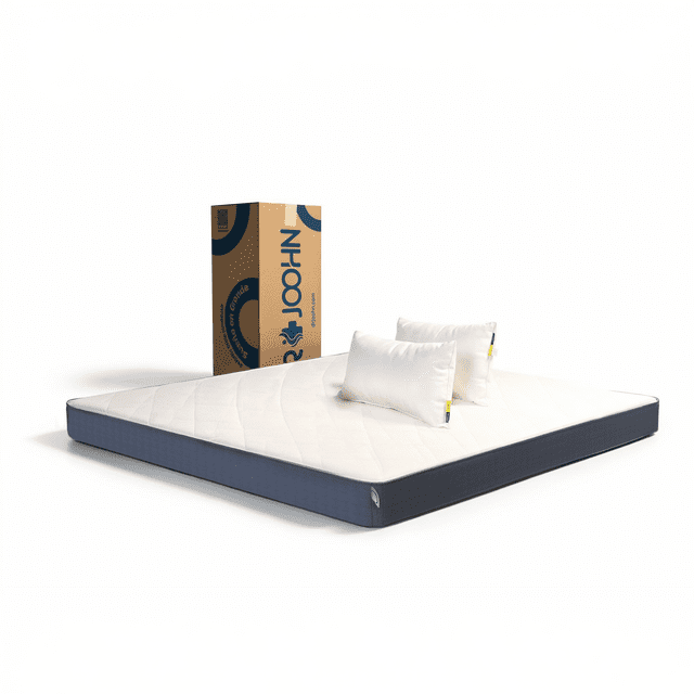 colchón en caja + 2 almohadas dr joohn king size basic 14cm altura semi-firme, para todas las edades. Vista 3/4 frontal de colchón king size blanco 190x200x14 cm con faldón azul oscuro y superficie acolchada en rombos, dos almohadas Essencial blancas sobre el centro y caja al vacío DR JOOHN detrás; espuma de alta densidad y funda extraíble según especificaciones; a menudo usado como colchón adicional para visitas.