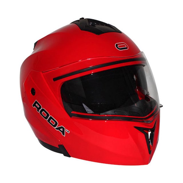 casco deportivo abatible para moto abs roda revenge xl color rojo roda revenge Casco integral Roda Revenge rojo XL (61–62 cm) en vista 3/4 derecha; carcasa roja con visera transparente y pantalla interna oscura, ventilaciones frontales y superior visibles, logo RODA lateral, hebilla micrométrica e interior tapizado removible. También suele usarse para prácticas de pista y entrenamiento de manejo urbano.