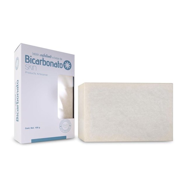 cuidado personal essential nutrition jabón de bicarbonato 100 gr barra sin perfumar color claro, vista frontal centrada junto a su caja blanca y azul con ventana; jabón corporal exfoliante de 100 g para uso diario y cuidado de la piel, también adecuado para manos.
