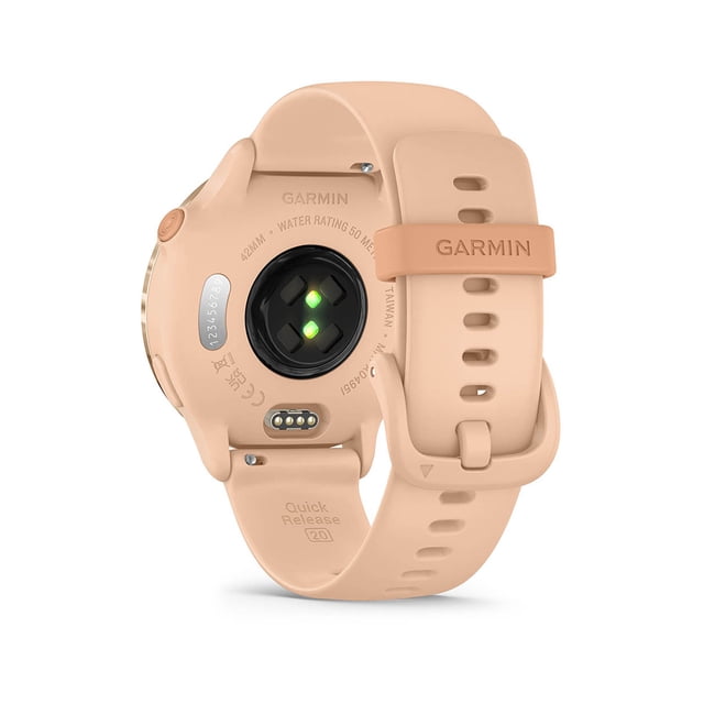 garmin monitor deportivo, vivoactive 6 rosa — vista trasera centrada del reloj con correa de silicón rosa y hebilla con marca GARMIN, sensor óptico de frecuencia cardiaca visible, contactos de carga y "Quick Release 20" grabado; indicado para entrenamientos animados y seguimiento de sueño y recuperación.