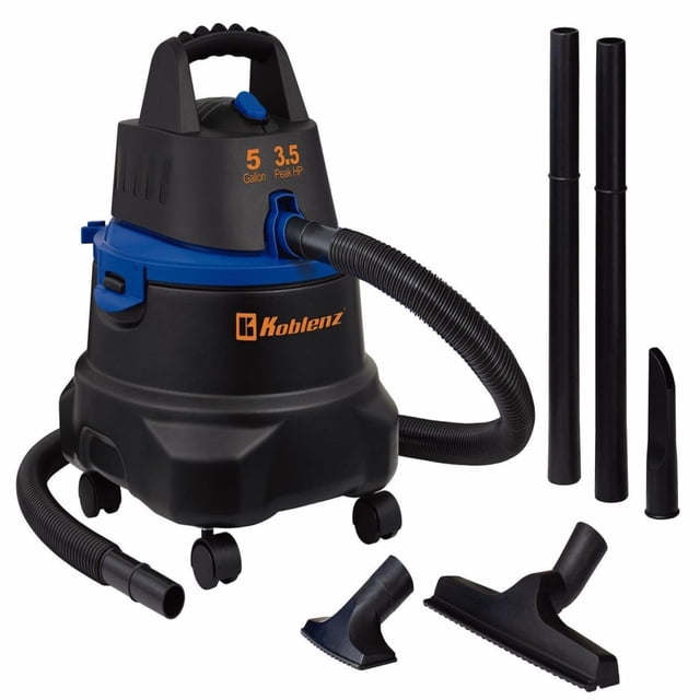 aspiradora koblenz wd-5 ma seco-mojado 5 gal accesorios multiusos Vista frontal centrada de la aspiradora Koblenz negra con detalles azules, tanque de 5 galones y texto 3.5 HP Pico; incluye manguera flexible 1 ¼” (1.8 m), 2 tubos telescópicos, boquilla para piso, boquilla multiusos, esquinero, filtro y 4 llantas; útil para limpieza en seco y mojado y suele usarse también para aspirar restos en talleres pequeños.