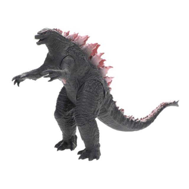 figura de acción bandai godzilla x kong movie monster series figura articulada de Godzilla (Hollywood) en vinilo blando multicolor, vista 3/4 de perfil con textura escamada, placas dorsales rosadas, cola larga curvada y altura aproximada de 6 pulgadas con etiqueta colgante; también apta para exhibición en estanterías o dioramas de colección.
