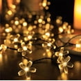 thumbnail image 4 of Luces solares para exteriores, guirnalda de flores con 20 luces LED, decoración navideña para jardín, cerca, patio, árbol de Navidad, hogar, boda, patio, fiesta, luz solar., 4 of 7