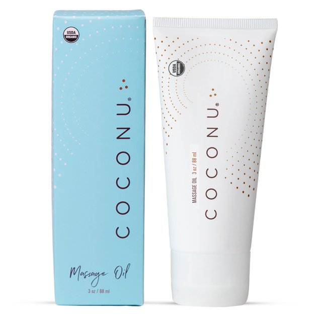 aceite de masaje aceite corporal de coco orgánico de coco 90 ml Tubo blanco y caja azul con marca COCONU en vista frontal, tipografía marrón y puntos dorados decorativos, sello USDA visible, envase liso y tapa; diseñado para masaje, hidratación y rutinas de spa.