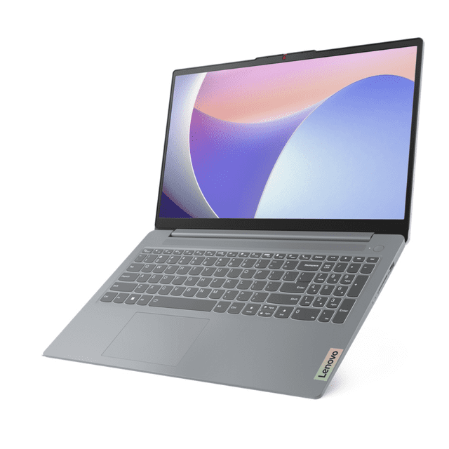 laptop lenovo ideapad slim 3 15.6' full hd intel core i5-12450h 12.a gen 8gb ddr5 512gb ssd m.2 windows 11 home 64-bit español gris — vista 3/4 frontal con pantalla Full HD de 15.6" y teclado en español que incluye la tecla Ñ; chasis gris mate, touchpad ligeramente a la izquierda del centro y bisel superior con cámara web y obturador de privacidad; conexiones según ficha: USB-C 3.2 Gen 1 (PD y DisplayPort 1.2), HDMI 1.4 y lector de tarjetas; adecuada para videollamadas y uso escolar u oficina.