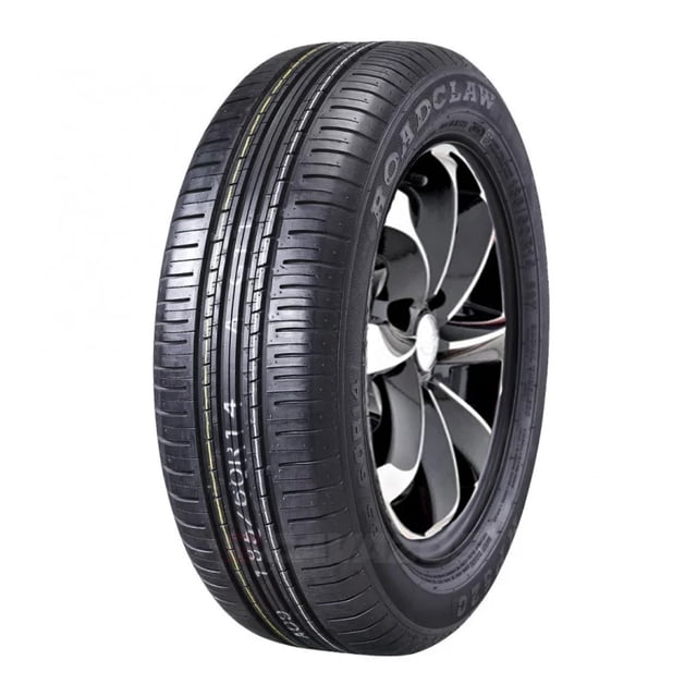 llantas 185/65 r14 roadclaw rp520 vista 3/4 frontal, neumático 185/65 R14 color negro con la marca Roadclaw en el flanco, banda de rodadura con tres surcos circunferenciales y bloques longitudinales, montado en rin gris; índice de carga 86, símbolo H y UTQG 320AA, diseñado para uso en carretera y desgaste uniforme; a menudo usado como reemplazo estándar para compactos y sedanes.