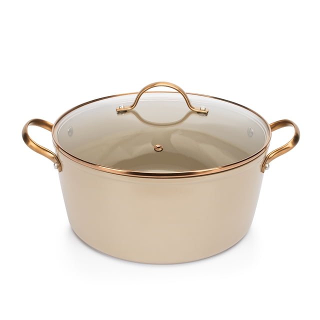 cacerola de aluminio forjado crown baccara gc24 24 cm beige con tapa. Vista frontal centrada de cacerola redonda de 24 cm con asas laterales y pomo en acabado rose gold, borde superior brillante y tapa de vidrio transparente que deja ver el interior liso; adecuada también para servir en mesa.