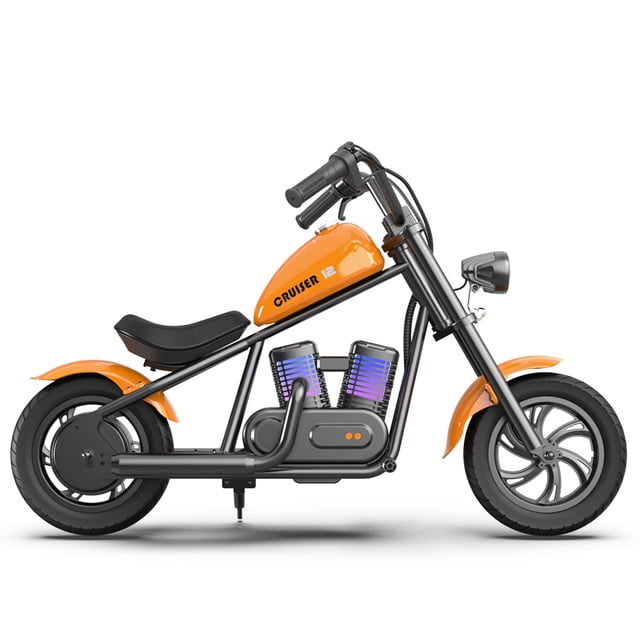 moto eléctrica infantil hyper gogo cruiser 12 plus naranja, vista lateral perfil derecho; chasis tubular negro con tanque naranja rotulado CRUISER 12, asiento bajo acolchado negro, llantas rodada 12 y guardabarros naranja, motor 24 V y batería visibles, faro con luz LED y bocina Bluetooth en el manillar. Tamaño del cuadro 115.07x72.45x49.87 cm, peso 17 kg, alcance aproximado 12 km, 3 niveles de velocidad ajustable y resistencia IP4.