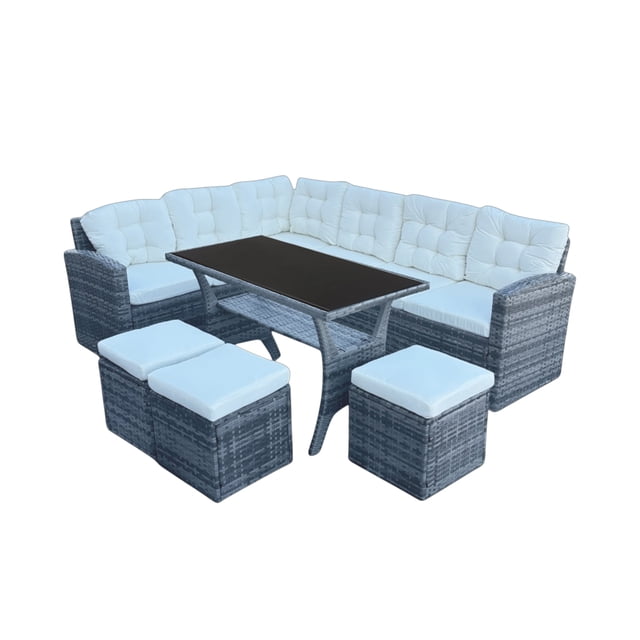juego de sala para jardín esquinera 5 piezas mimbre sintético ilios innova — vista 3/4 frontal de conjunto gris para exterior con 2 sofás esquinero con brazos, mesa rectangular (mesa 120 cm) con superficie oscura y 3 taburetes cúbicos con cojines blancos; tejido rattan sintético visible, cojines con cremalleras, mesa con patas en V. A menudo usado como comedor exterior para reuniones en terraza o jardín.