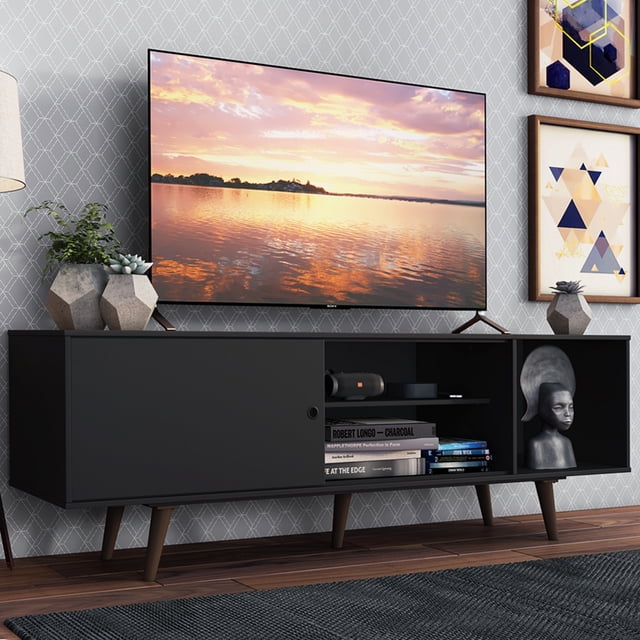 mueble mesa para tv rack madesa dubai hasta 65'' nn Rack Dubai Madesa negro 160x53x39 cm, vista frontal con TV; mueble rectangular con puerta corrediza izquierda, tres nichos abiertos a la derecha, abertura trasera para cables, pies cónicos marrón y acabado en poliéster protector; ideal también para organizar consolas y libros.