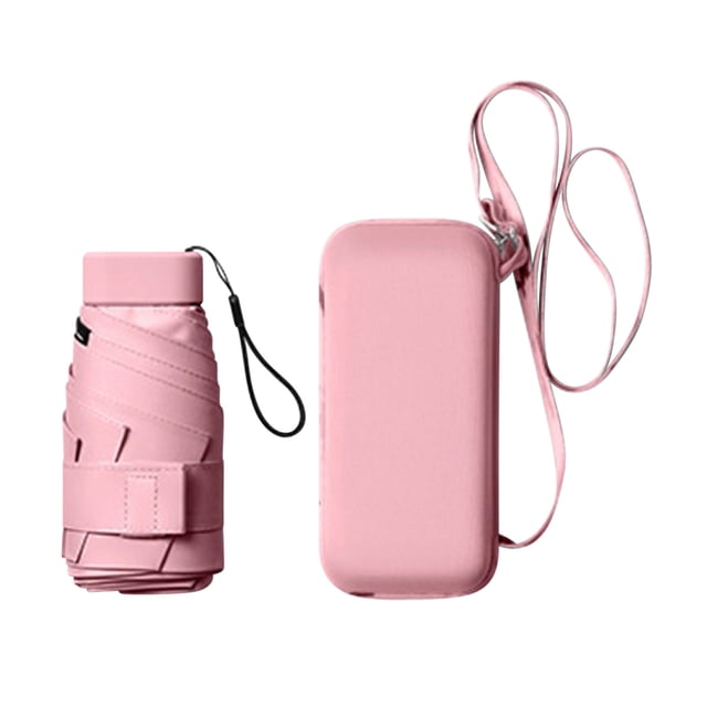 xihbxyly paraguas de bolsillo anti-uv, diseño plegable compacto rosa; vista frontal de paraguas cerrado junto a funda rígida con correa, tela lisa y cierre de velcro visibles, apertura manual y mango de aleación ligero según ficha, diámetro 90 cm; ideal como accesorio de viaje y a menudo usado para protección solar en salidas veraniegas.