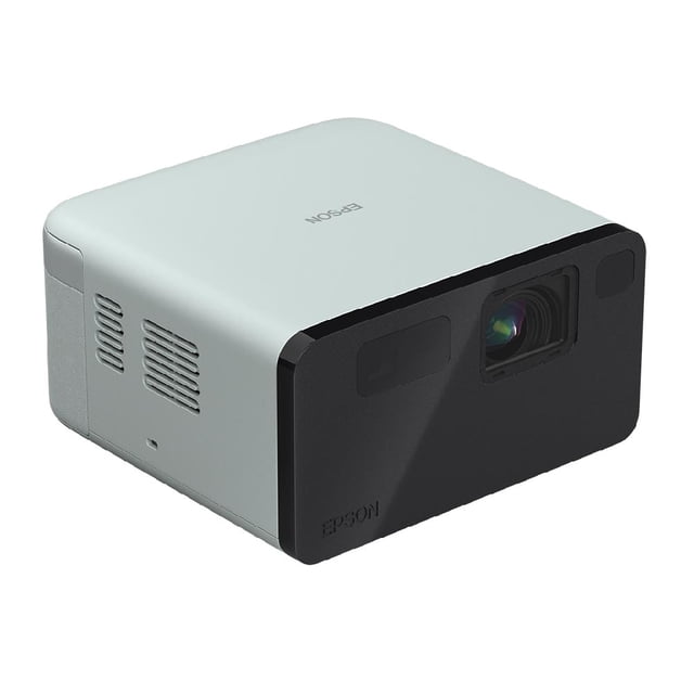 proyector láser epson epiqvision ef21 portátil smart tv - verde ópalo Vista 3/4 frontal del proyector portátil Epson EpiqVision EF21 en verde ópalo, carcasa compacta con frente negro mate, lente central y rejillas laterales; integrado con Google TV y audio Dolby, imagen Full HD HDR hasta 150", ideal para noches de cine al aire libre.