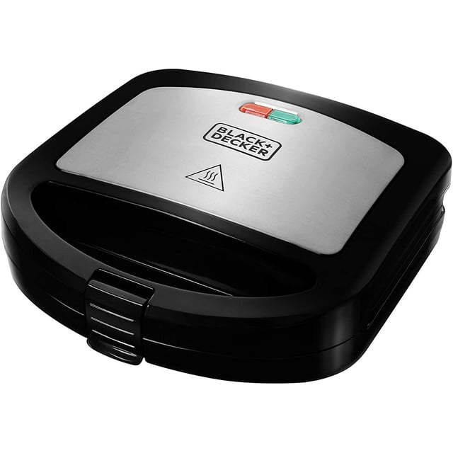 sandwichera 2 rebanadas black & decker antihaderente 12 velocidad 700 w bl-1140ms gris, vista frontal 3/4 de sandwichera compacta para dos rebanadas con tapa plateada y carcasa gris/negra, indicadores luminosos rojo y verde en la parte superior, cierre frontal y mango integrado; placas internas antiadherentes visibles. Apta para cocinas pequeñas y a menudo usada también para calentar paninis ligeros.