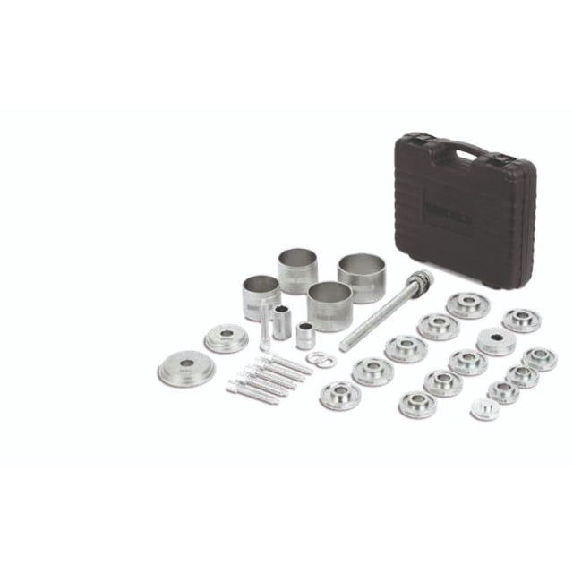 kit de herramientas para cojinetes (31 pzas) Mikel´s — vista frontal con maletín rígido negro al fondo y, sobre fondo blanco, adaptadores y casquillos metálicos cilíndricos de distintos diámetros, eje extractor tubular y juego de tornillos y tuercas alineados; también usado a menudo para alineación y prensa ligera en talleres.