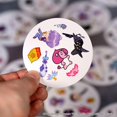 thumbnail image 4 of Juego de cartas Spot It! Cazadores de Demonios K‑Pop – Zygomatic, 4 of 8