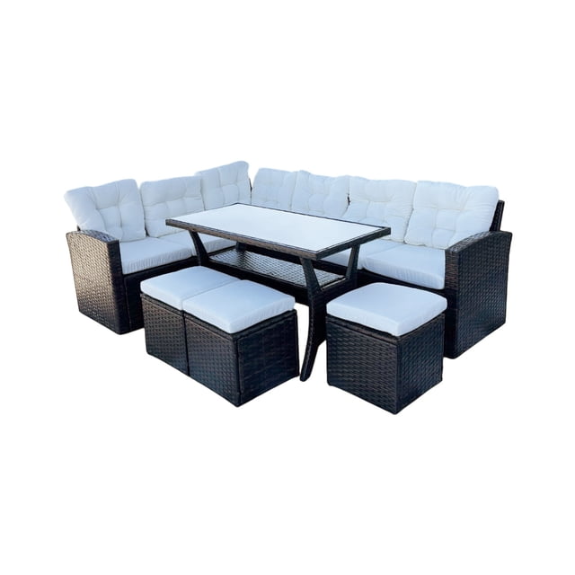 ilios innova juego de sala para jardín esquinera 6 piezas mesa de centro de cristal templado sofás de mimbre sintético acojinados — Conjunto esquinero color café de poliratán con cojines blancos, vista frontal 3/4 mostrando sofás en L, mesa rectangular con tapa de cristal templado y dos bancos-taburete acojinados; tejido rattan sintético y cojines con cremallera resistentes a UV. Fondo blanco, pensado para terraza o jardín; también suele usarse como zona de reuniones al aire libre.