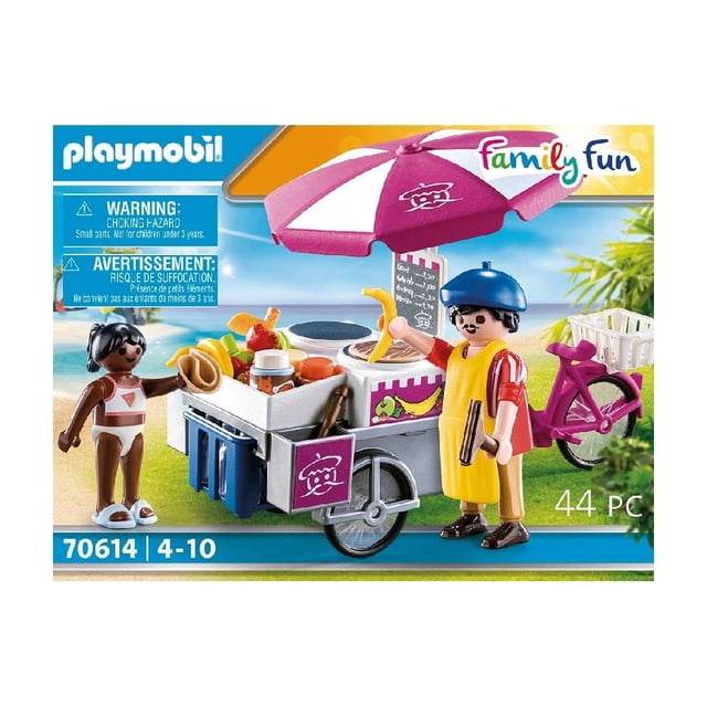 set de juego playmobil carrito de crepes 44 piezas multicolor, vista frontal del carrito con parasol rosa y blanco, vendedor Playmobil con delantal amarillo y casco azul y clienta en traje de baño, carrito con rueda lateral y bicicleta rosa acoplada, accesorios visibles: sartén, crepes y toppings; apto como juguete de juego de rol en la playa.