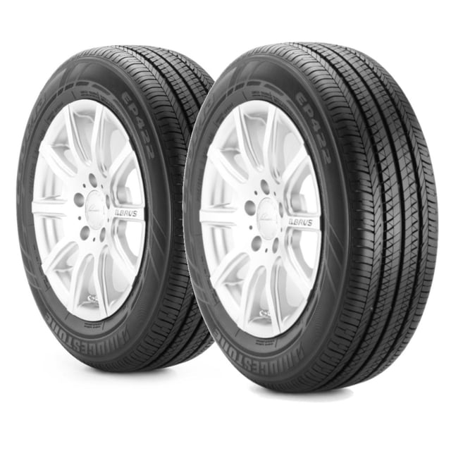 paquete de 2 llantas 205/55 r17 91h bridgestone ecopia ep422 plus, vista 3/4 frontal de dos llantas montadas en rines plateados, dibujo de banda con ranuras circunferenciales y laminillas visibles para tracción en mojado, flancos marcados con EP422 y Bridgestone; no incluye rin. Adecuadas para conducción confortable y estabilidad; también suelen usarse para rotación estacional de neumáticos.