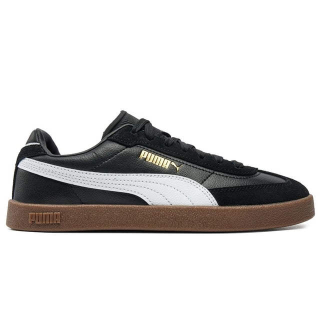 tenis puma club ii era para hombre 397447-02 negro 27.5 zapatilla en perfil derecho, silueta baja retro en gamuza y cuero negro con formstrip blanca, logotipo PUMA dorado en el lateral y entresuela texturizada color café oscuro. A menudo usados también como calzado casual urbano por su estilo inspirado en fútbol.