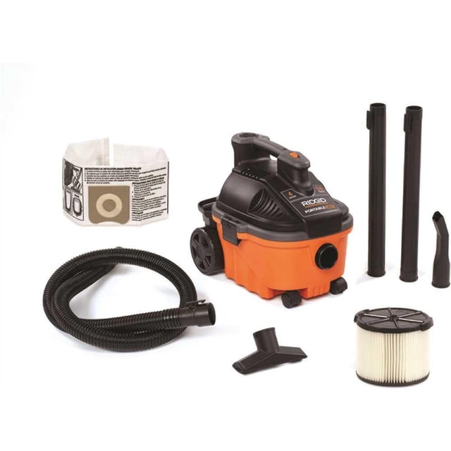aspiradora de sólidos y líquidos ridgid negro naranja 5.0 hp Aspiradora RIDGID WD4070 4 galones, vista 3/4 frontal del equipo naranja con tapa negra y asa; tanque con ruedas y compartimiento para accesorios. Incluye manguera corrugada de 2.1 m, dos tubos de extensión, boquilla ancha y estrecha, filtro tipo cartucho y bolsa de filtro; cable de 20 pies y diseño ligero (18.32 lbs). Adecuada para limpieza húmeda y seca en taller o casa; suele usarse también para residuos de proyectos de bricolaje.